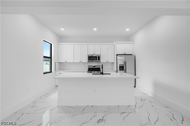 1633 NW 31st PL, Cape Coral, FL 33993