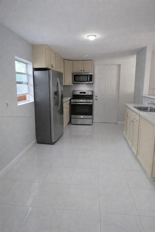 Image 12 of property listing at 9407 NW 4th Ave, Miami, FL 33150