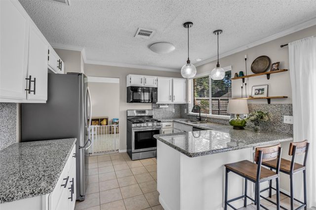 9415 Towerstone Drive, Spring, TX 77379