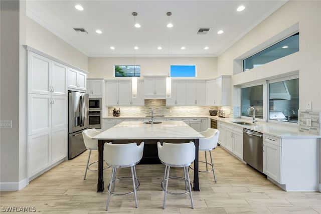 5715 Clarendon DR, Naples, FL 34113