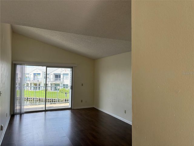 2556 WOODGATE BOULEVARD 203, Orlando, FL 32822
