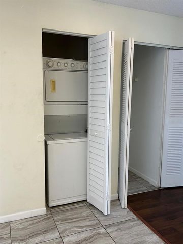 2556 WOODGATE BOULEVARD 203, Orlando, FL 32822