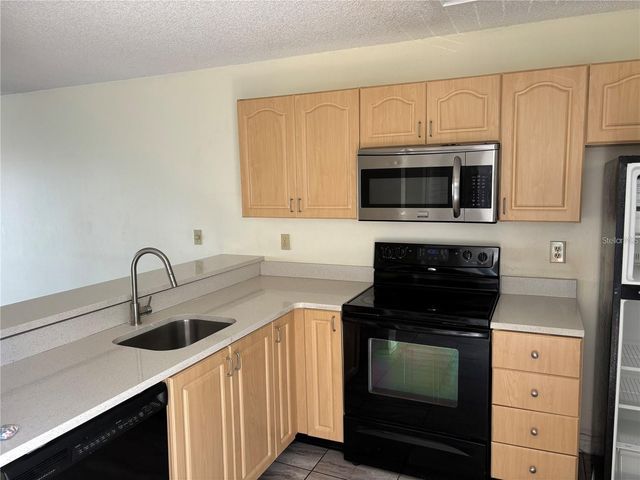 2556 WOODGATE BOULEVARD 203, Orlando, FL 32822