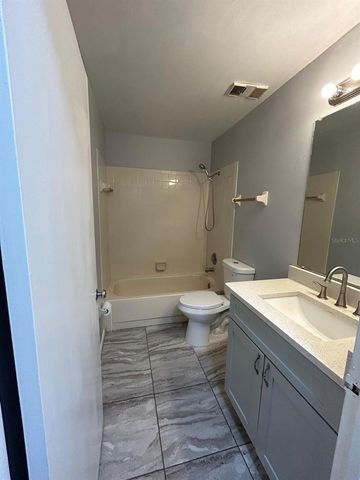 2556 WOODGATE BOULEVARD 203, Orlando, FL 32822