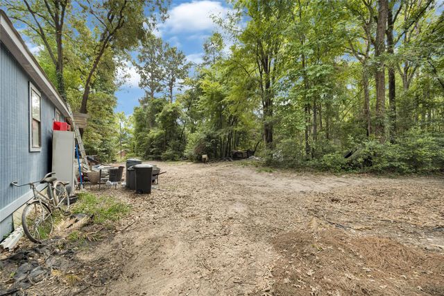 203 Lazy Hollow Lane, Livingston, TX 77351