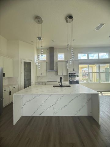 9803 GOBAT ALLEY, Orlando, FL 32827