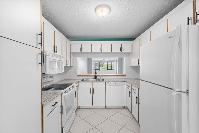10837 W CLAIRMONT Circle 208, Tamarac, FL 33321