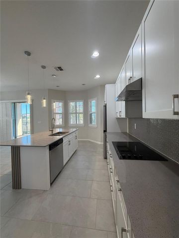 13183 WOODFORD STREET, Orlando, FL 32832