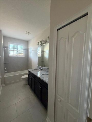 13183 WOODFORD STREET, Orlando, FL 32832