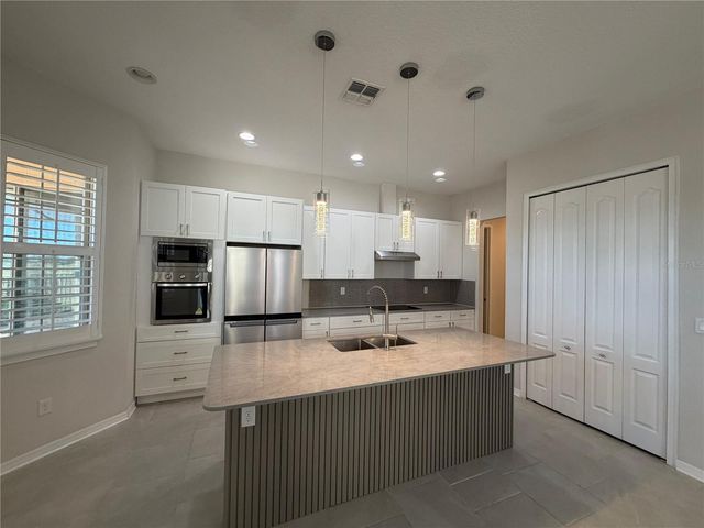 13183 WOODFORD STREET, Orlando, FL 32832