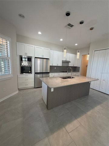 13183 WOODFORD STREET, Orlando, FL 32832