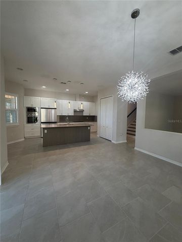 13183 WOODFORD STREET, Orlando, FL 32832