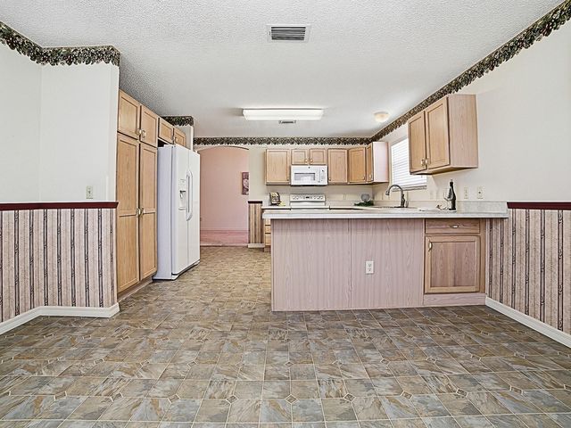 16865 SE 93RD CUTHBERT CIRCLE, The Villages, FL 32162