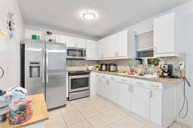 5735 Kumquat Road, West Palm Beach, FL 33413