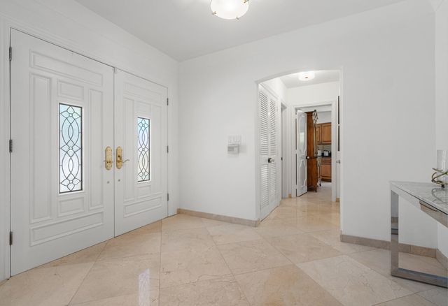 57 Cayuga Road, Sea Ranch Lakes, FL 33308