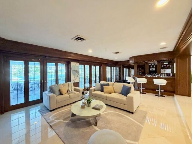57 Cayuga Road, Sea Ranch Lakes, FL 33308
