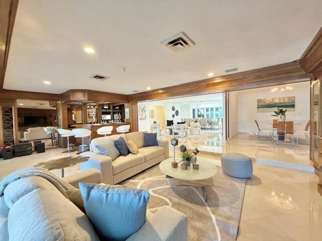 57 Cayuga Road, Sea Ranch Lakes, FL 33308
