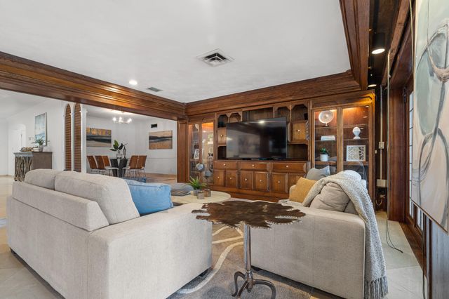 57 Cayuga Road, Sea Ranch Lakes, FL 33308