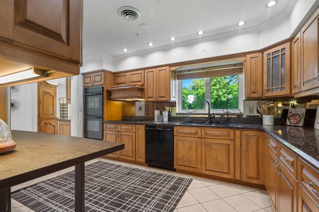 57 Cayuga Road, Sea Ranch Lakes, FL 33308