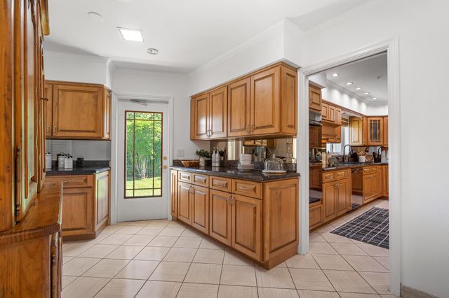 57 Cayuga Road, Sea Ranch Lakes, FL 33308
