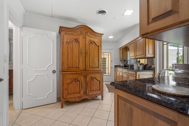 57 Cayuga Road, Sea Ranch Lakes, FL 33308