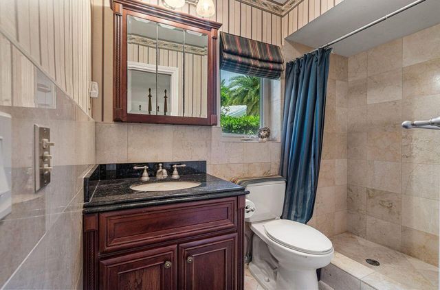 57 Cayuga Road, Sea Ranch Lakes, FL 33308
