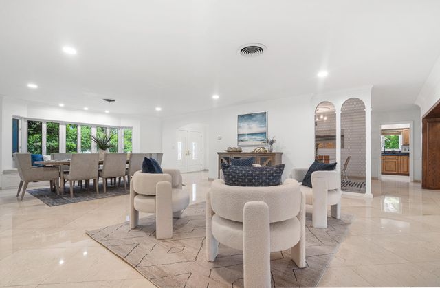 57 Cayuga Road, Sea Ranch Lakes, FL 33308