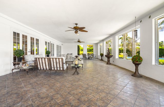 57 Cayuga Road, Sea Ranch Lakes, FL 33308