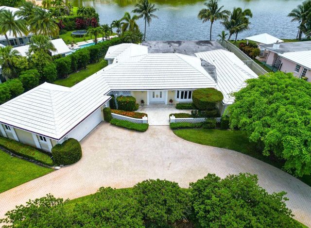 57 Cayuga Road, Sea Ranch Lakes, FL 33308