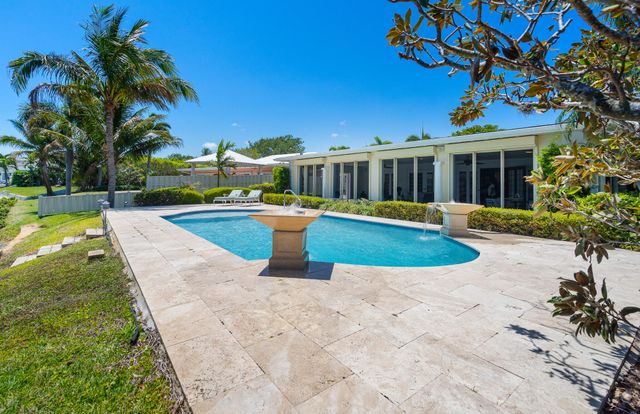57 Cayuga Road, Sea Ranch Lakes, FL 33308