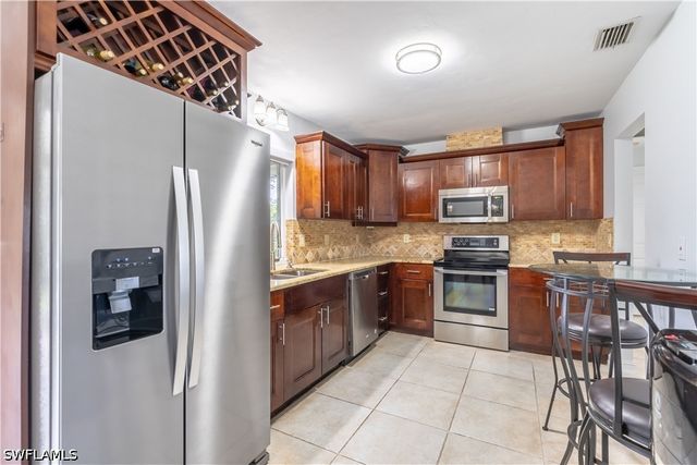 2100 55th ST SW, Naples, FL 34116
