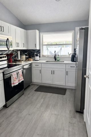 24944 JOINER COURT, Lutz, FL 33559