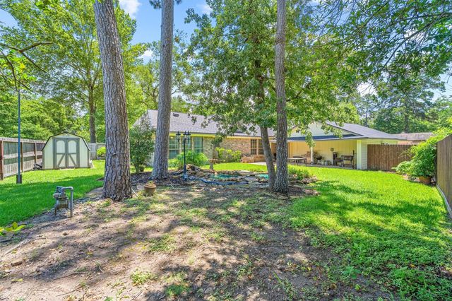 826 N Rivershire Drive, Conroe, TX 77304