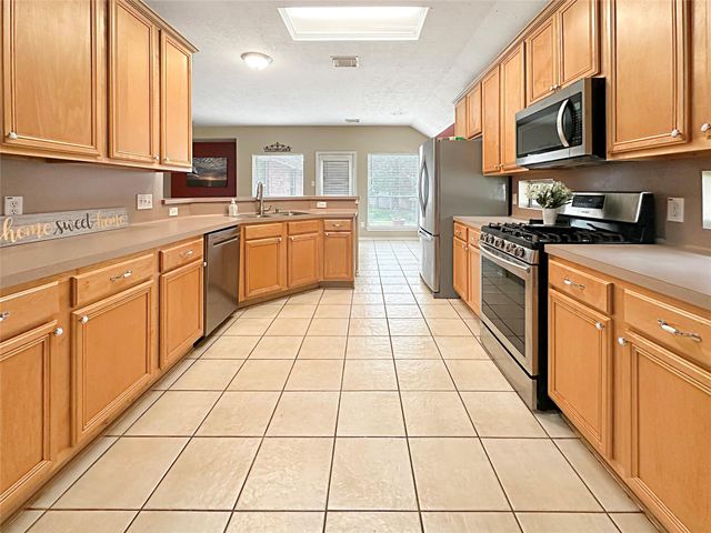 6506 Rustling Timbers Lane, Spring, TX 77379