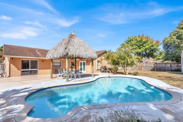 105 Sunflower Circle, Royal Palm Beach, FL 33411