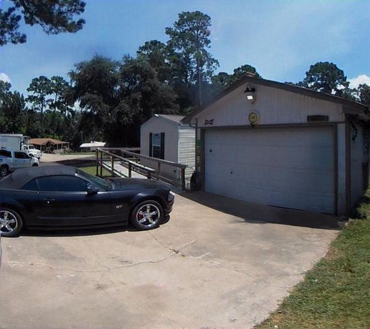 152 E Oak Shadows, Onalaska, TX 77360