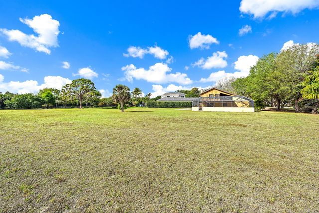 8090 Native Dancer Road E, Palm Beach Gardens, FL 33418