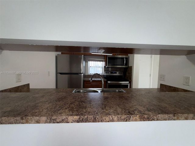 8560 N Sherman Circle 105, Miramar, FL 33025