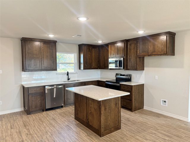 1001 Brown Court, Poolville, TX 76487