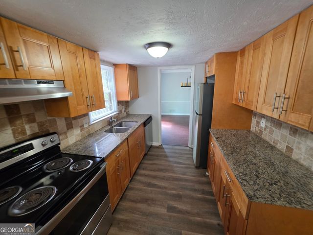 5051 Golfbrook Drive, Stone Mountain, GA 30088