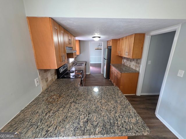 5051 Golfbrook Drive, Stone Mountain, GA 30088