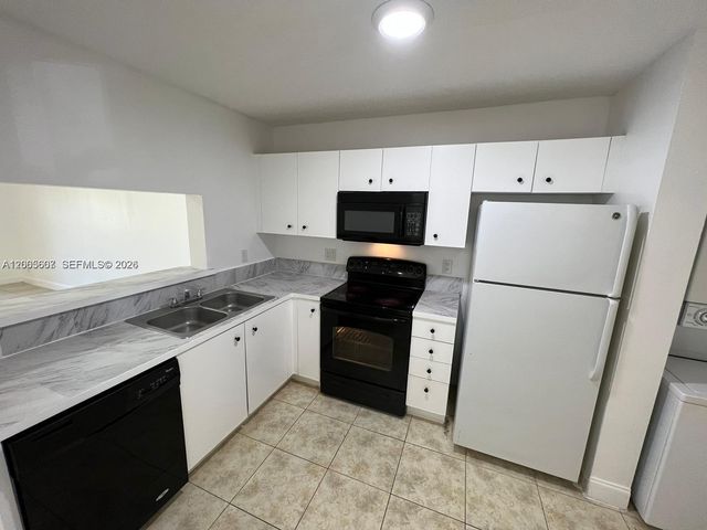 2421 NW 56th Avenue 2-103, Lauderhill, FL 33313