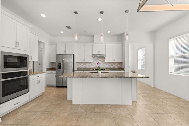 1855 FLORA PASS PLACE, Kissimmee, FL 34747