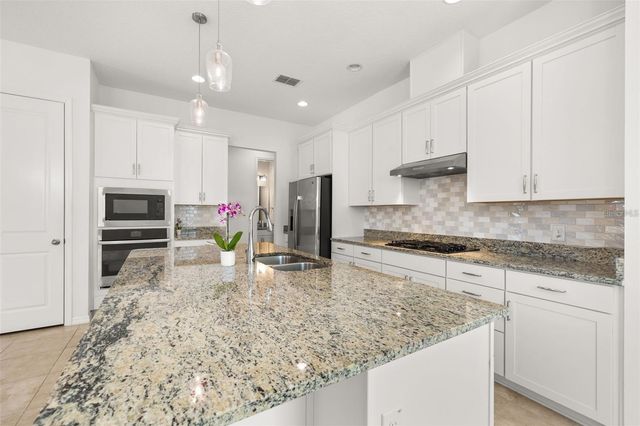 1855 FLORA PASS PLACE, Kissimmee, FL 34747