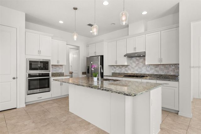 1855 FLORA PASS PLACE, Kissimmee, FL 34747