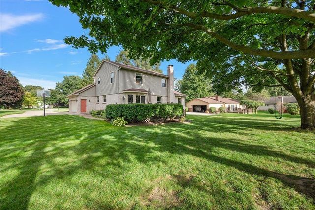 61411 WOODFIELD Way, Washington Twp, MI 48094