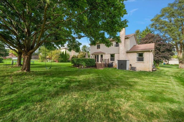 61411 WOODFIELD Way, Washington Twp, MI 48094