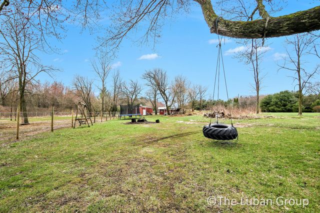 8753 Wabasis Avenue NE, Greenville, MI 48838