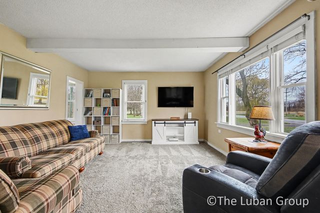 8753 Wabasis Avenue NE, Greenville, MI 48838