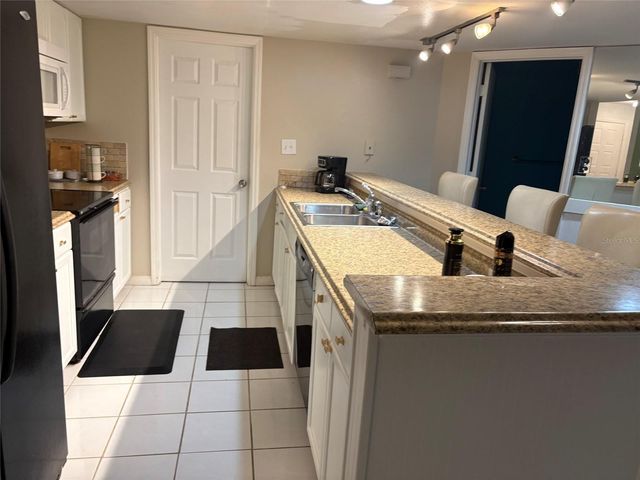 2511 2511 DOLLY BAY DRIVE 102, Palm Harbor, FL 34684